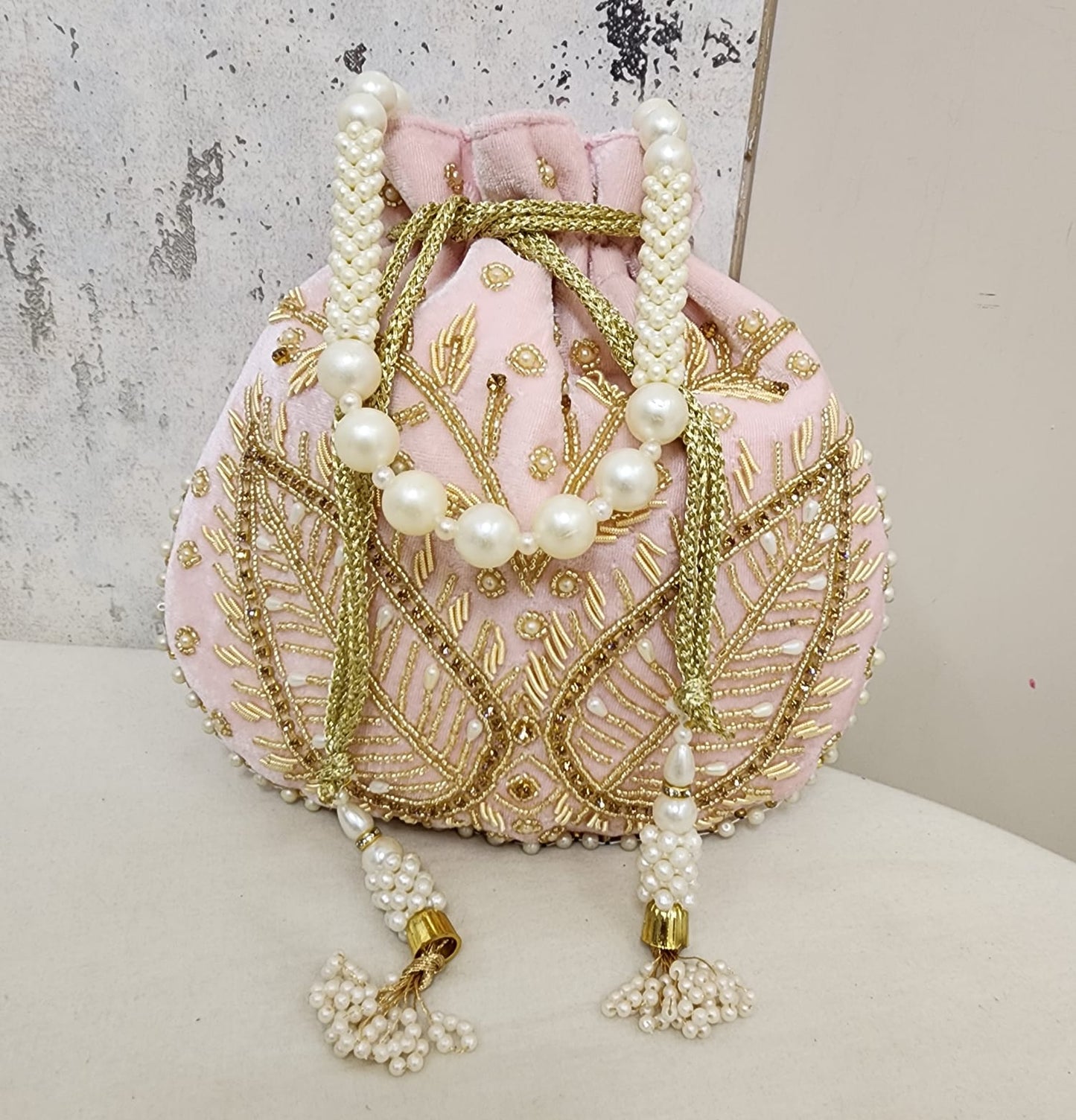 Royal Velvet Potli Bag with Pearl Handle & Zari Embroidery