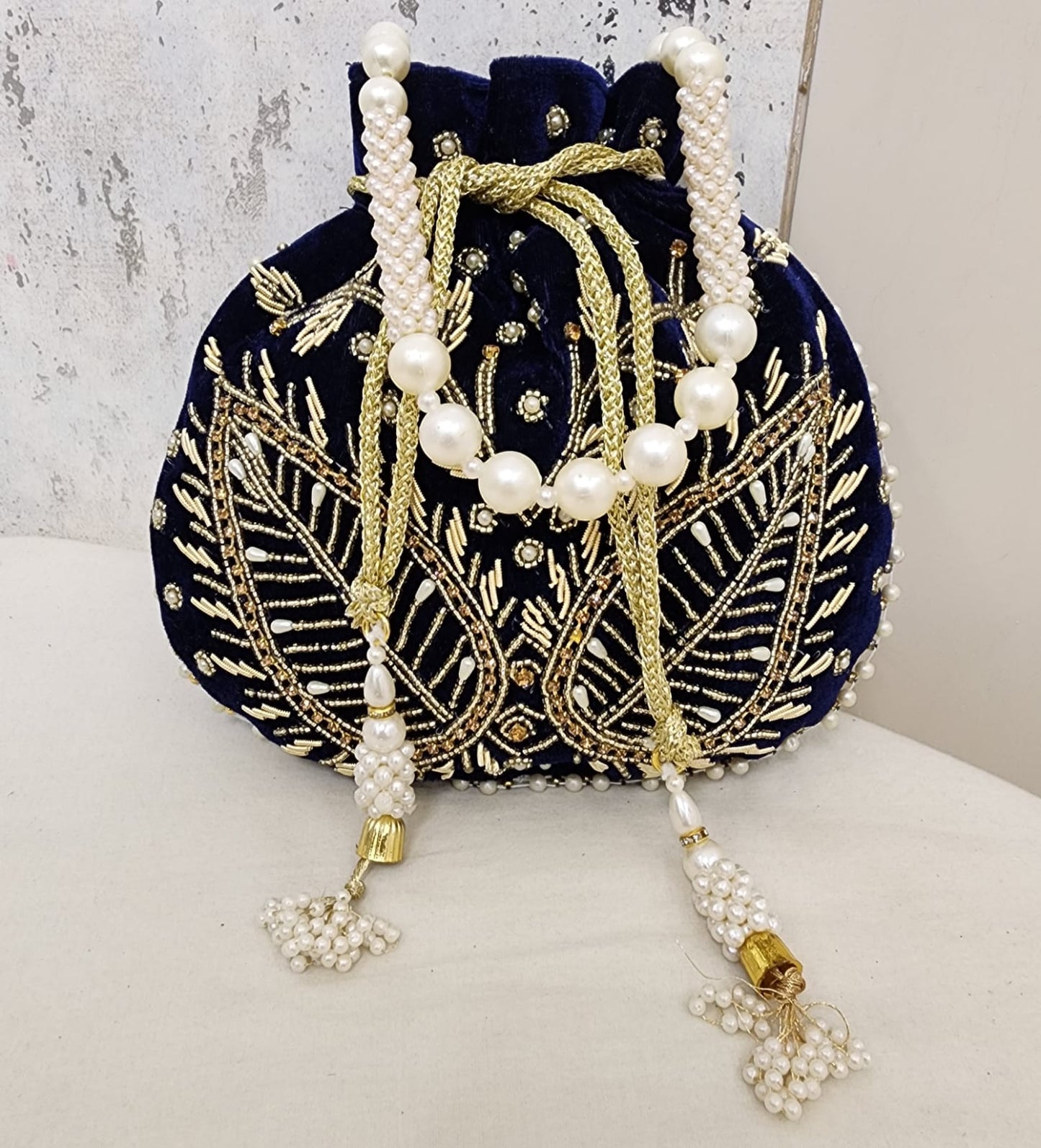 Royal Velvet Potli Bag with Pearl Handle & Zari Embroidery