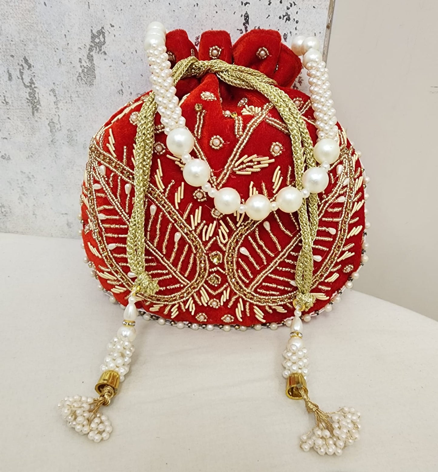 Royal Velvet Potli Bag with Pearl Handle & Zari Embroidery