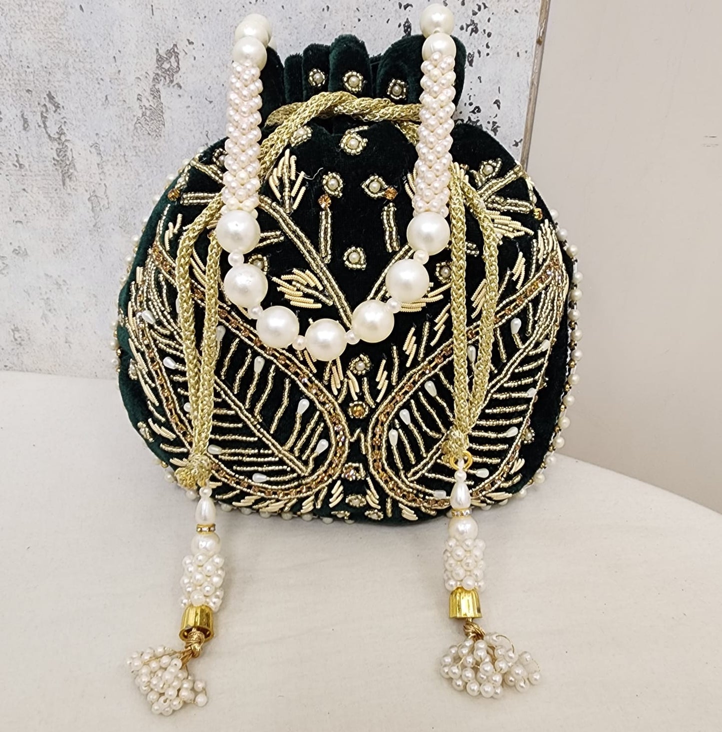 Royal Velvet Potli Bag with Pearl Handle & Zari Embroidery