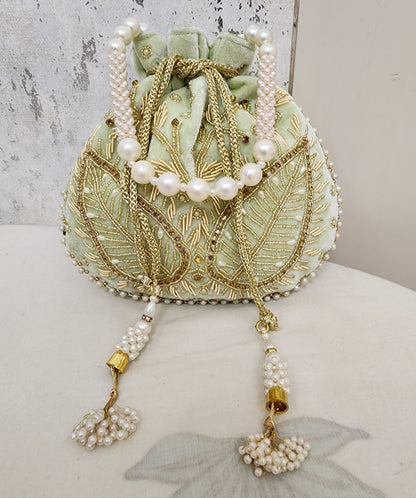 Royal Velvet Potli Bag with Pearl Handle & Zari Embroidery
