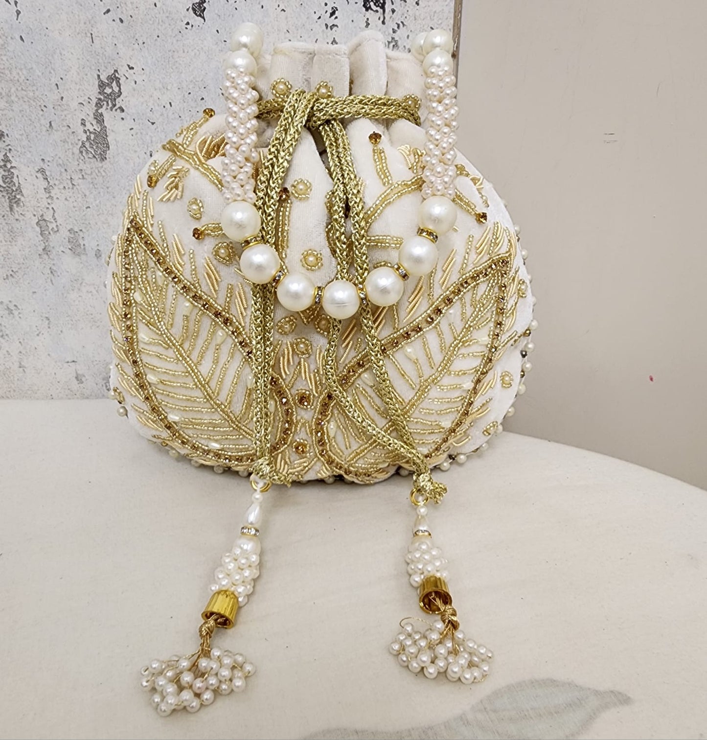 Royal Velvet Potli Bag with Pearl Handle & Zari Embroidery