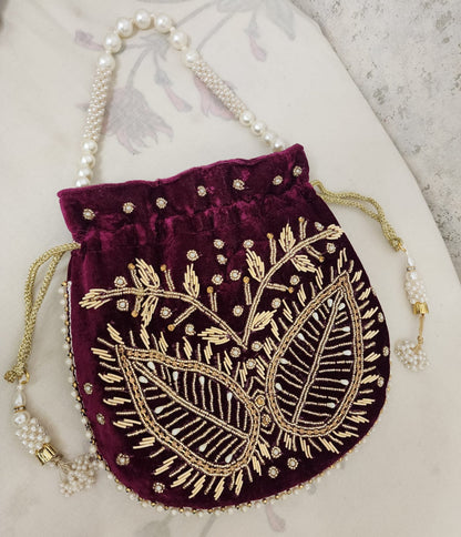 Royal Velvet Potli Bag with Pearl Handle & Zari Embroidery