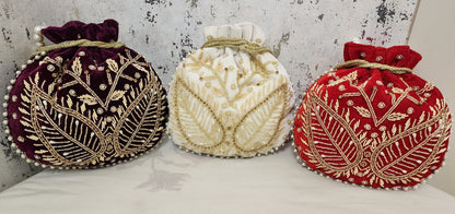 Royal Velvet Potli Bag with Pearl Handle & Zari Embroidery