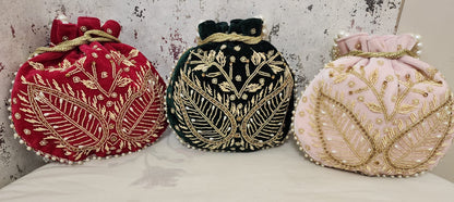 Royal Velvet Potli Bag with Pearl Handle & Zari Embroidery