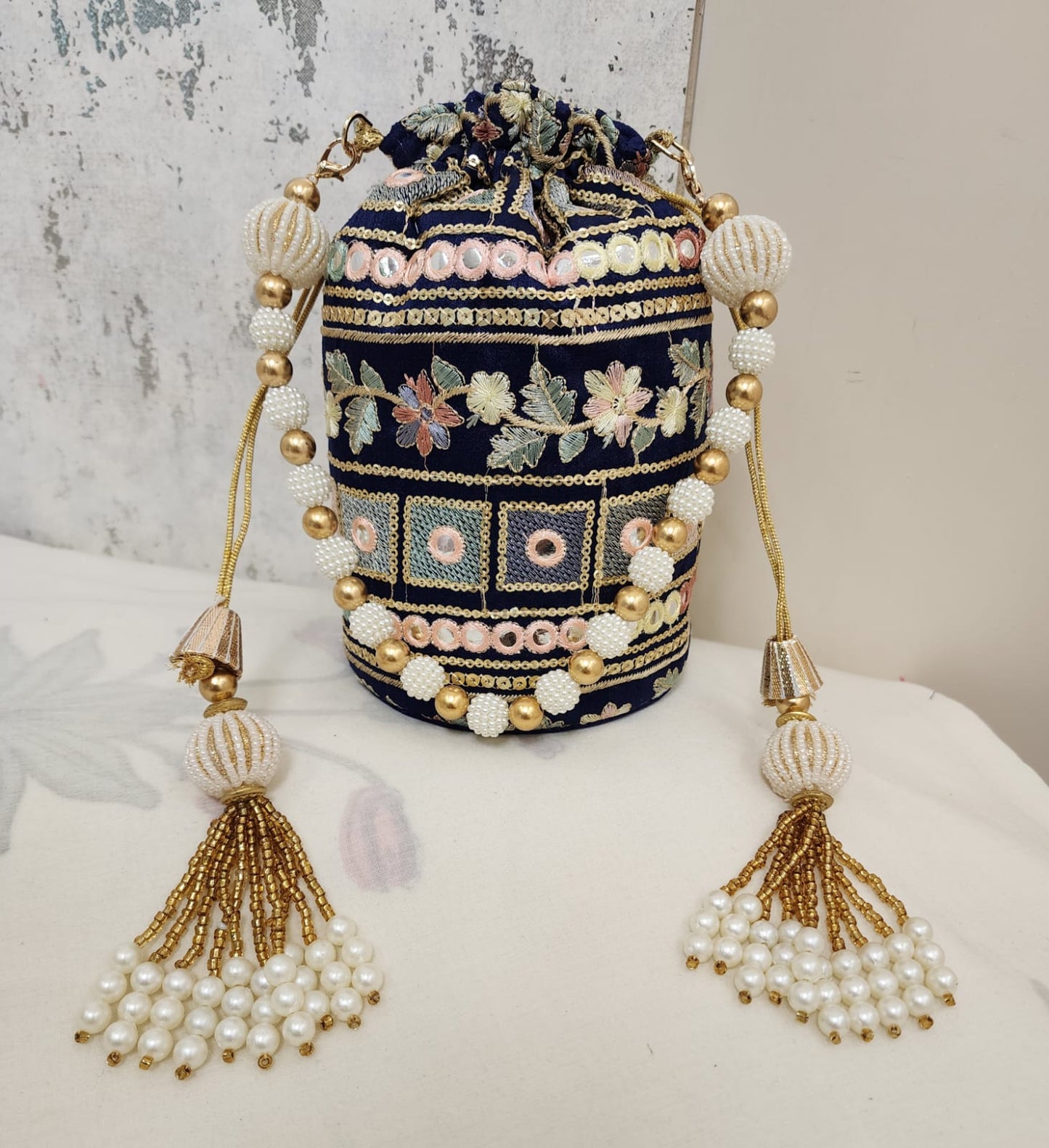Vintage Mirror Embroidered Potli Bag with Pearl Tassels