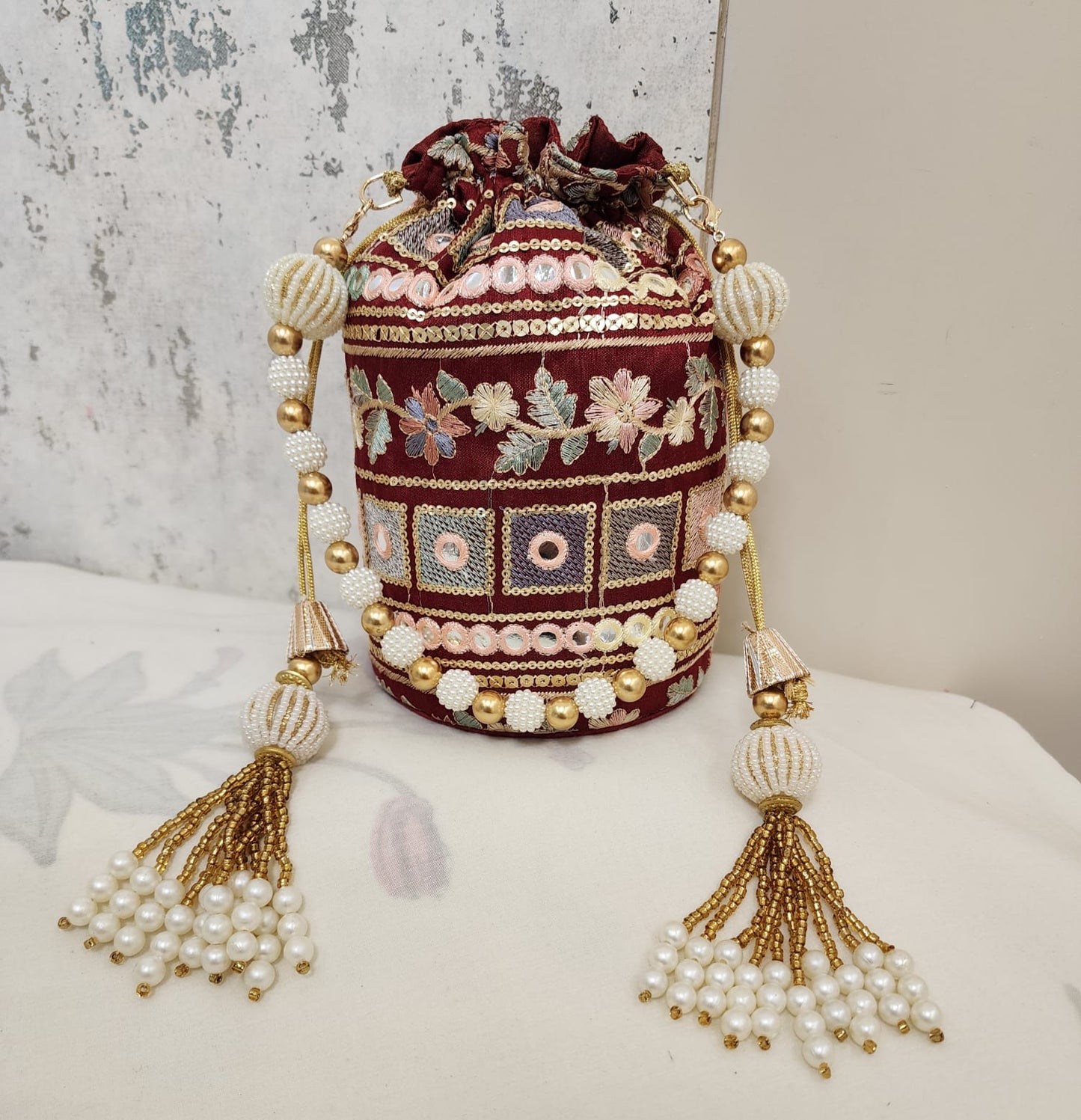 Vintage Mirror Embroidered Potli Bag with Pearl Tassels