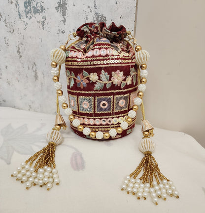 Vintage Mirror Embroidered Potli Bag with Pearl Tassels