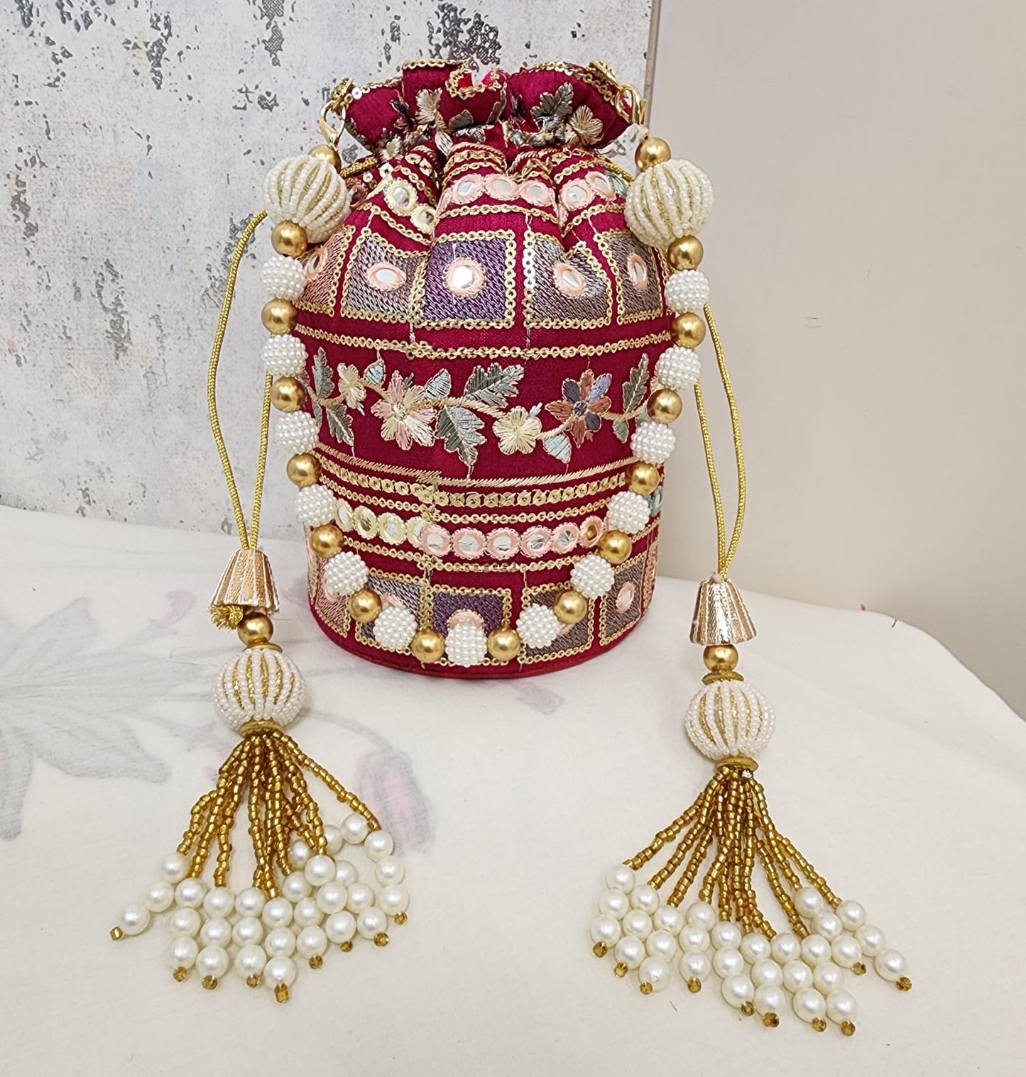 Vintage Mirror Embroidered Potli Bag with Pearl Tassels