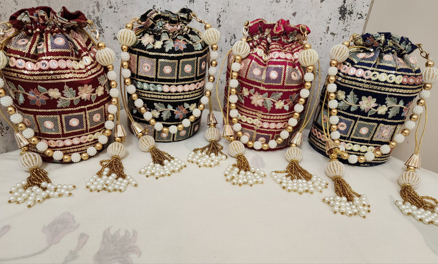 Vintage Mirror Embroidered Potli Bag with Pearl Tassels