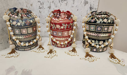 Vintage Mirror Embroidered Potli Bag with Pearl Tassels